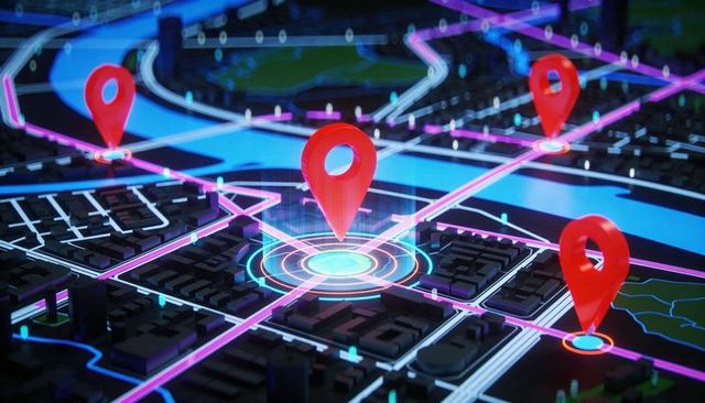 Neon city map with central red location pin highlighting urban waypoints and smart routing