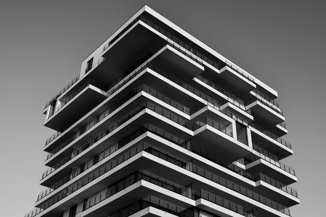 Grayscale Photo of Concrete Building - Download Free Stock Photos Pikwizard.com