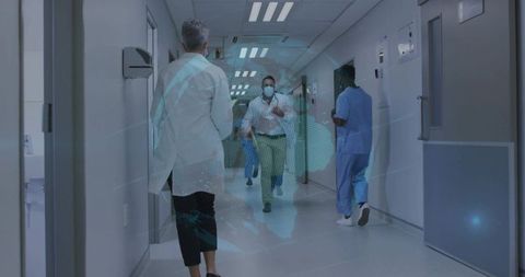 Healthcare team walking through hospital corridor with digital global network overlay