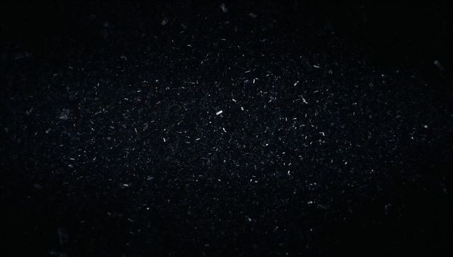Glinting Particles in Dark Abstract Void