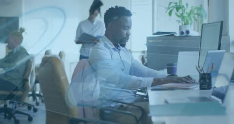 Modern Professional Analyzing Data at Office Desk