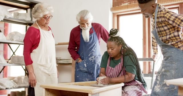 Diverse Group Learning Pottery Together - Download Free Stock Images Pikwizard.com