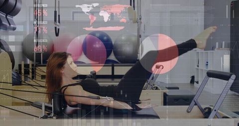 Woman Performing Pilates Ab Exercises Reformer Studio