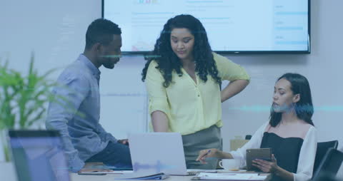 Diverse Business Team Analyzing Data Analytics in Modern Office