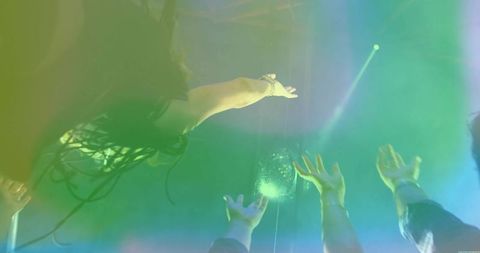 Vibrant Nightclub Celebration Focus on Dance and Disco Ball