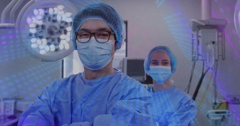 Surgical Team Wearing Protective Scrubs and Masks in Operation Room