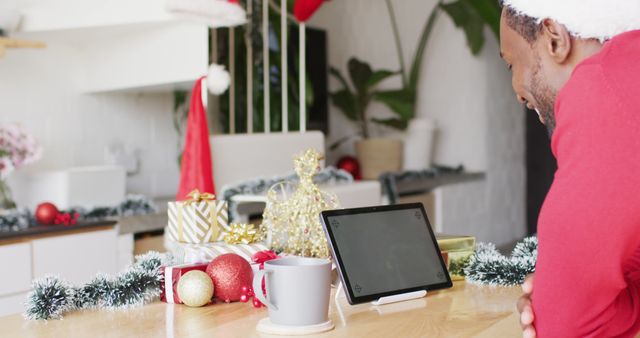 Man Celebrating Christmas Day Online from Cozy Kitchen - Download Free Stock Images Pikwizard.com