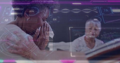 Senior woman blowing nose in digital health technology setting