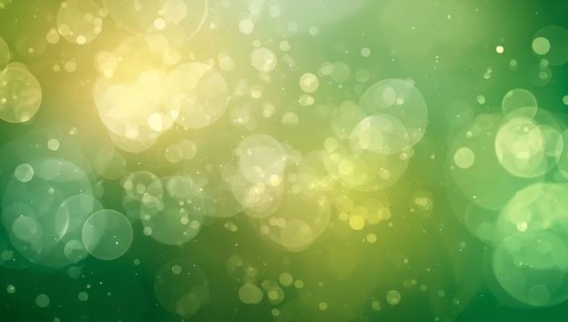 Green and gold bokeh background with soft luminous circles and floating light particles