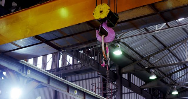 Modern hoist machine hanging in workshop 4k