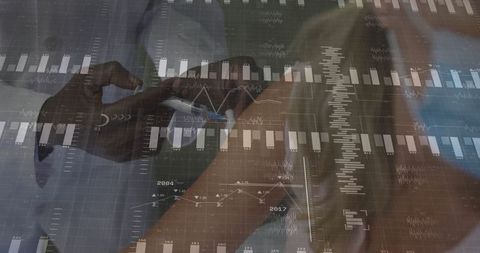 Business professionals analyzing financial data with smartphone and stylus