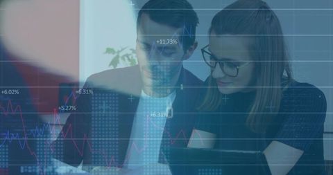 Two Business Professionals Analyzing Financial Data for Success