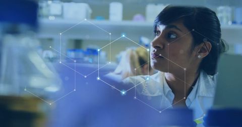 Innovative Biracial Female Scientist Analyzing Data in Laboratory - Download Free Stock Images Pikwizard.com