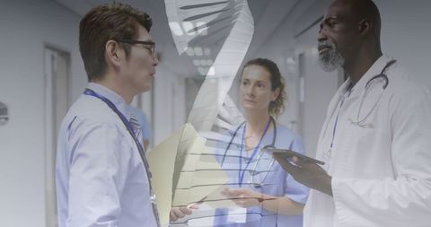 Medical Professionals Discussing Genetic Research in Hospital Corridor