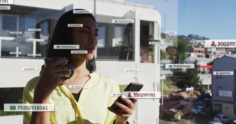 Woman with Smartphone Engaging with Social Media Application Interfaces