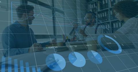 Business Team Analyzing Data with Digital Charts in Modern Office
