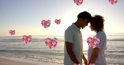 Romantic Couple Holding Hands on Sunlit Beach