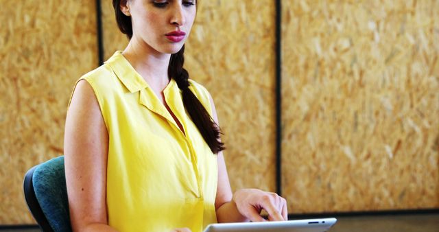 Focused businesswoman using digital tablet in office - Download Free Stock Images Pikwizard.com