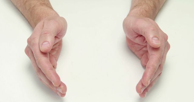 Close-Up of Hands Gesturing on White Background - Download Free Stock Images Pikwizard.com