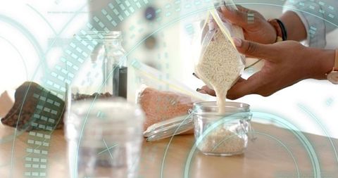 Organized grain storage with jar and bag system in modern kitchen