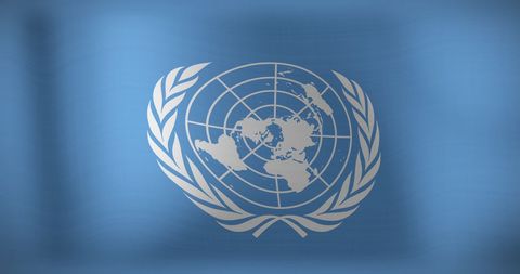 symbolizing global unity and peace, this united nations flag represents international cooperation and diplomacy. suitable for use in articles about global governance, international relations, or worldwide collaborative efforts.