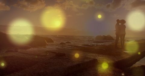 Romantic African American Couple Embracing at Sunset by the Ocean - Download Free Stock Images Pikwizard.com