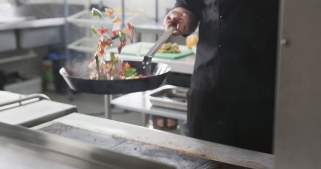 Chef Stir-Frying Colorful Vegetables in Professional Kitchen - Download Free Stock Images Pikwizard.com