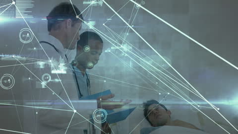 Doctors Assessing Patient with Digital Network Interface