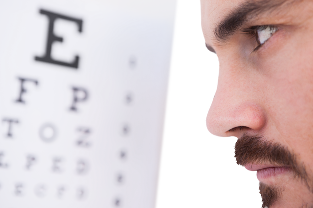 Close-up of Focused Man Performing Eye Test with Transparent Background - Download Free Stock Videos Pikwizard.com