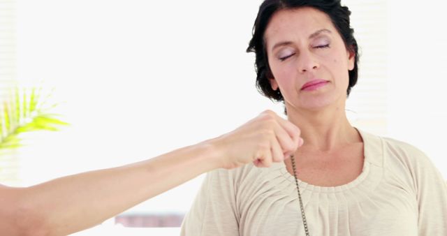 Woman Experiencing Relaxation During Hypnosis Therapy Session - Download Free Stock Images Pikwizard.com