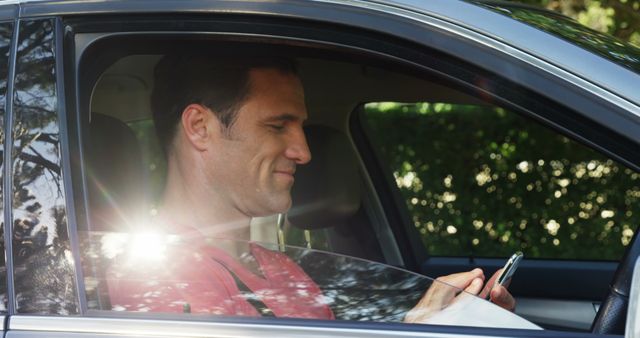 Man Texting on Phone While Sitting in Car - Download Free Stock Images Pikwizard.com