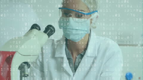 Female Scientist Analyzing Data in Laboratory Setting