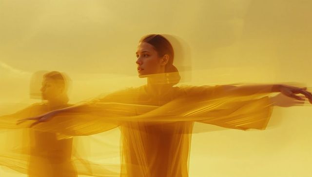 Dancing in Yellow: Motion Captured in Elegance and Fluidity