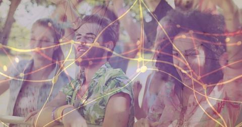 Young People Enjoying Music Festival Outdoors