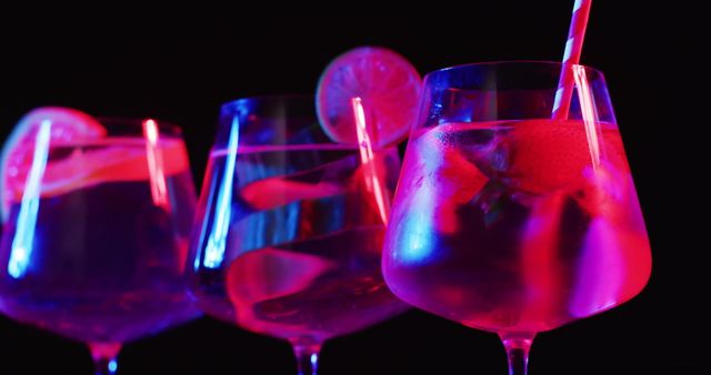 Glowing Neon Cocktails with Limes at Festive Celebration - Download Free Stock Images Pikwizard.com