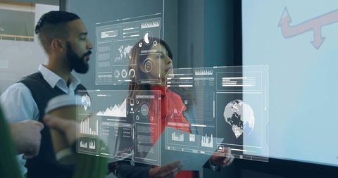 Business Team Analyzing Interactive Data Projections