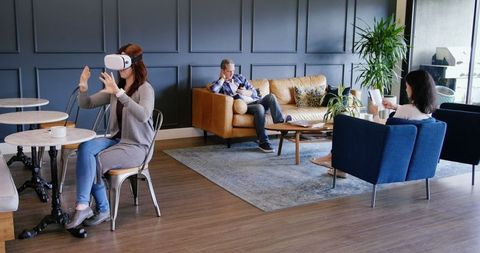 Virtual Reality in Modern Office Lobby with Professional Team