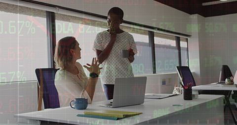 Business Colleagues Collaborating in Modern Office with Data Overlay