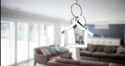 Metallic House-Shaped Keyring in Modern Living Room