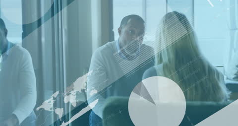 Diverse Colleagues Analyzing Data Graphics in Modern Office