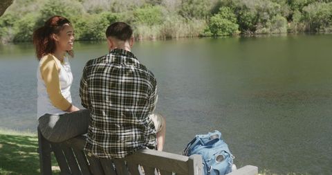 Diverse Couple Enjoying Peaceful Riverside Moment - Download Free Stock Images Pikwizard.com