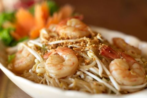 Close-Up of Delicious Shrimp Pad Thai with Vegetables and Ground Peanuts