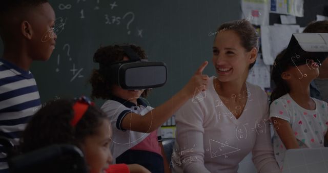 Teacher and Children Engaging with Virtual Reality in Classroom - Download Free Stock Images Pikwizard.com