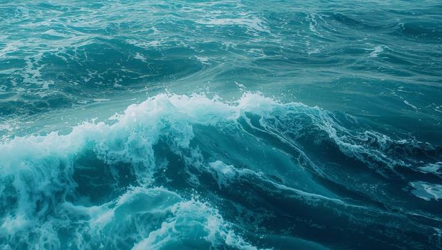 Dynamic ocean waves with cresting white foam