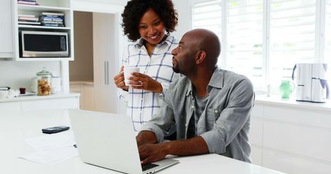 Couple Collaborating in a Bright Kitchen Atmosphere - Download Free Stock Images Pikwizard.com