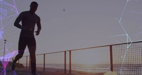 Man Running With Digital Connectivity Effects at Sunset by Seaside