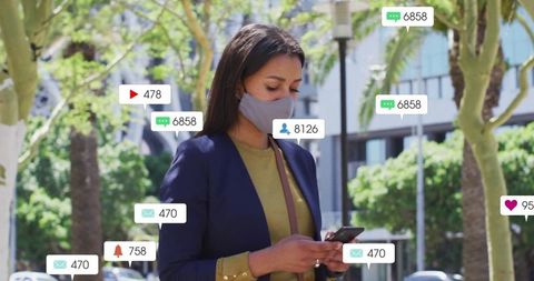 Woman Engaged with Social Media Notifications Outdoors