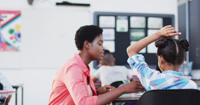 Energetic African American Female Teacher Engages Diverse Classroom of Elementary Students - Download Free Stock Images Pikwizard.com