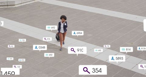 African American Woman Networking Through Social Media Icons on Street