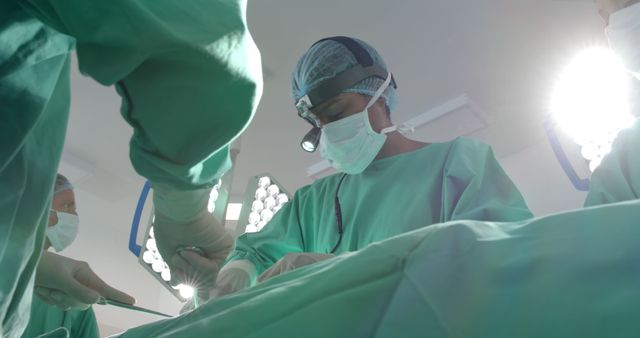 Surgeons Performing Medical Operation in Operating Room - Download Free Stock Images Pikwizard.com